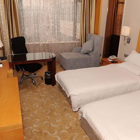 Shanghai Sky Rainbow Hotel Habitación foto