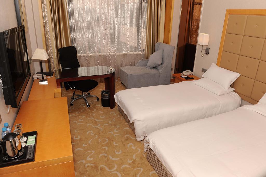 Shanghai Sky Rainbow Hotel Habitación foto