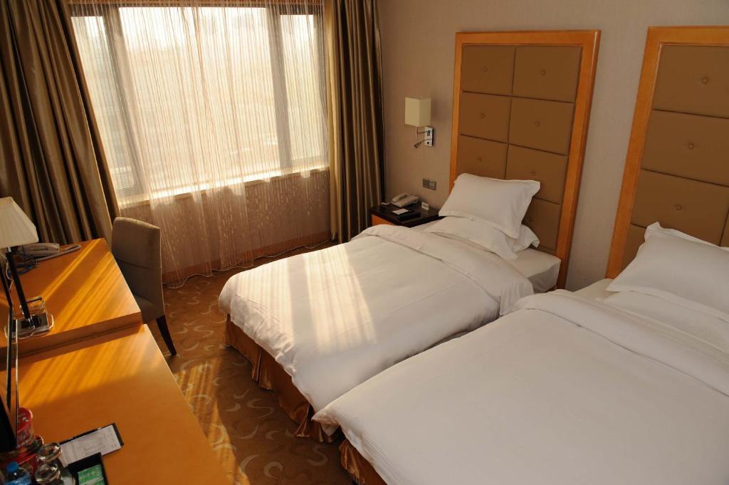 Shanghai Sky Rainbow Hotel Habitación foto